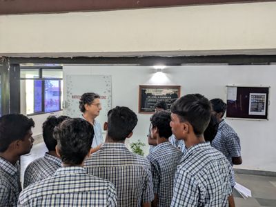 Shrihari Gopalakrishna interacting with students after his talk on fundamental particles. (Photo: Mani)