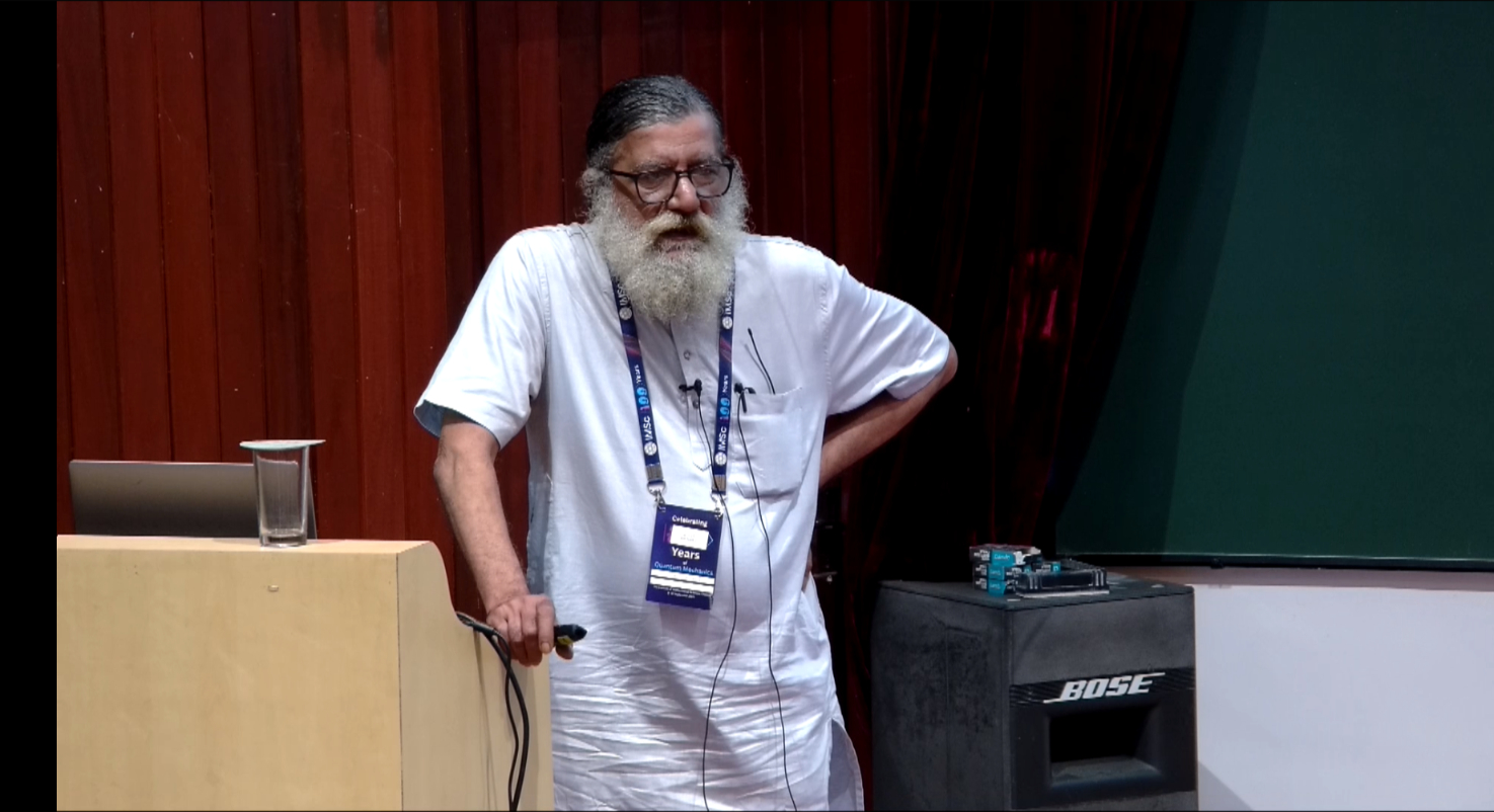 R Shankar (retired IMSc) presented a talk on 'Fractional Statistics.'