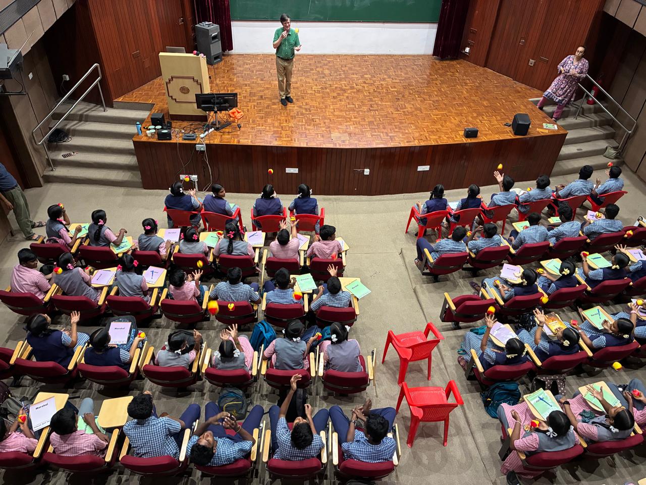 Steven Spallone holds everyone’s attention in his hands, using juggling routines to introduce mathematical sequences. (Photo: Mani)